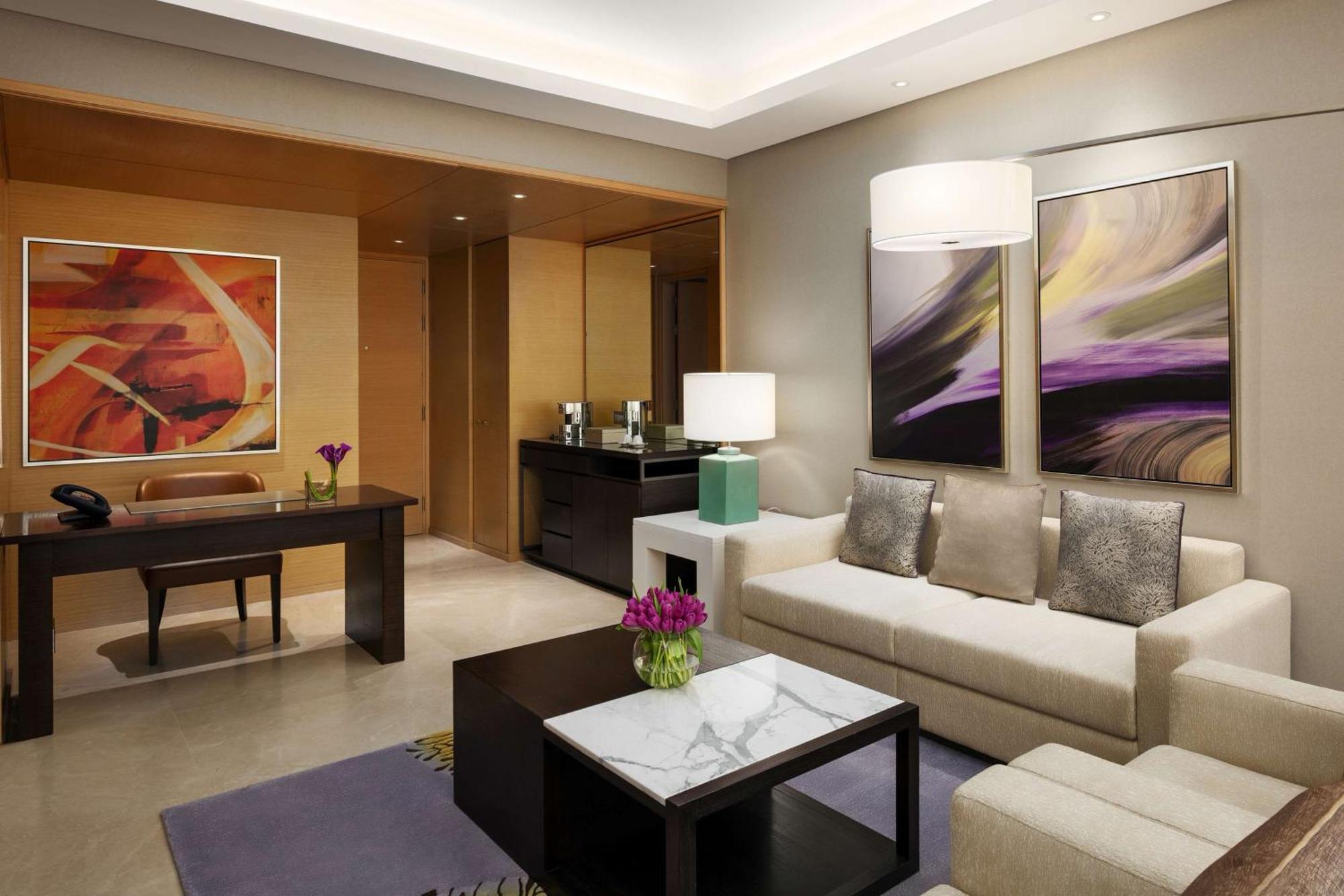 Hyatt Regency Riyadh Olaya Kültér fotó A living room in a suite at the Ritz-Carlton, Dubai